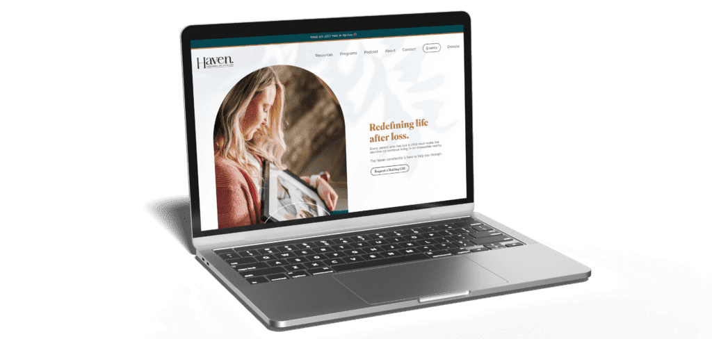 Mockup showing a laptop with the screen displaying the website of Haven: Redefining Life After Loss.